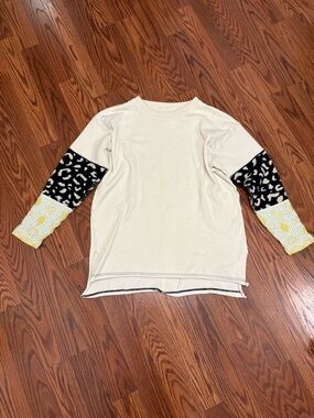 We The Free Cream Sweatshirt with Leopard Sleeve Panels and Yellow Cuffs